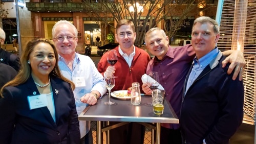 1060 Capital, LLCteam members socializing at an event