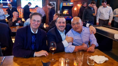 1060 Capital, LLCteam members socializing at an event